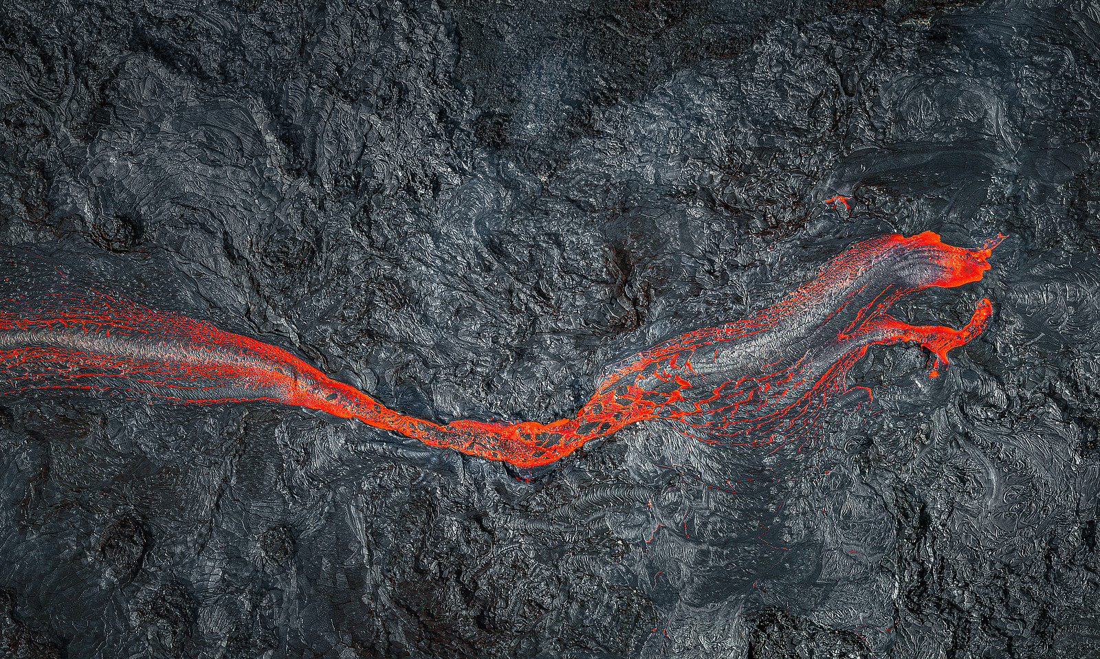 a photo of a lava river