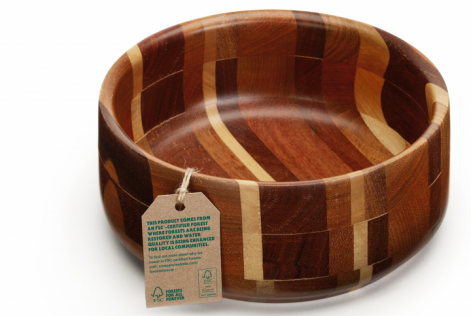 a wooden bowl with FSC tag