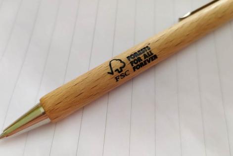 an image of a wooden pen with FSC logo