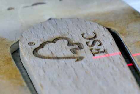 a wooden ladle with FSC logo