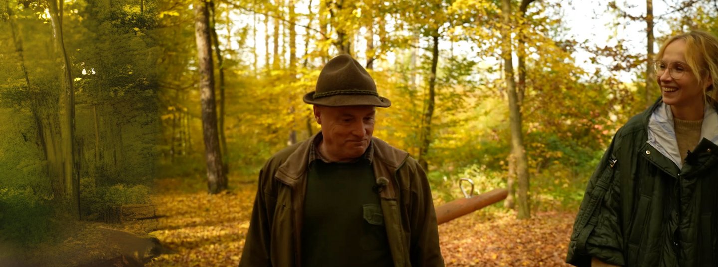 Jana Plodková and Josef Holeš walking through woods